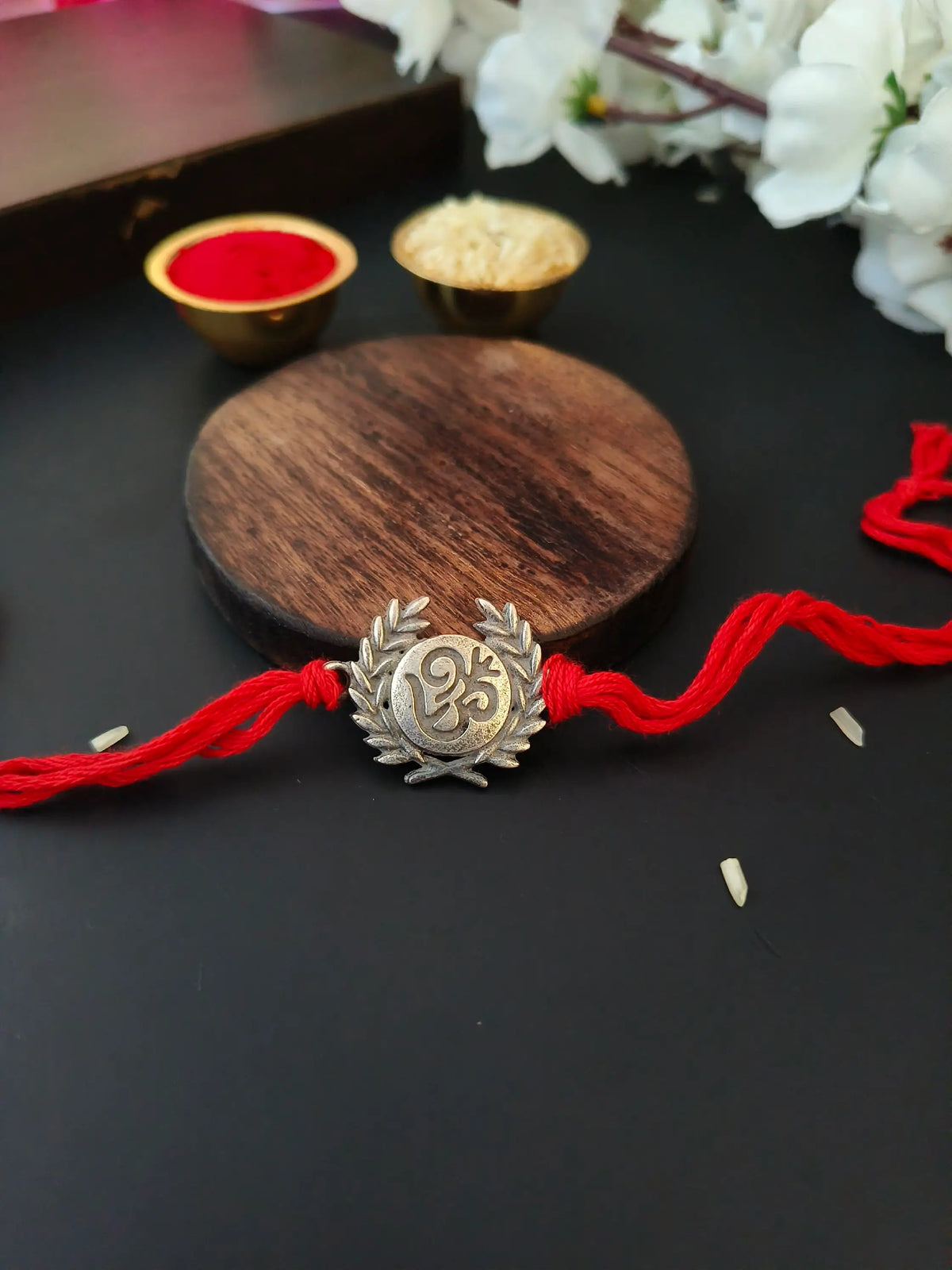 Divine Om Leaf Rakhi in Silver Finish | Dynamic Jewelove