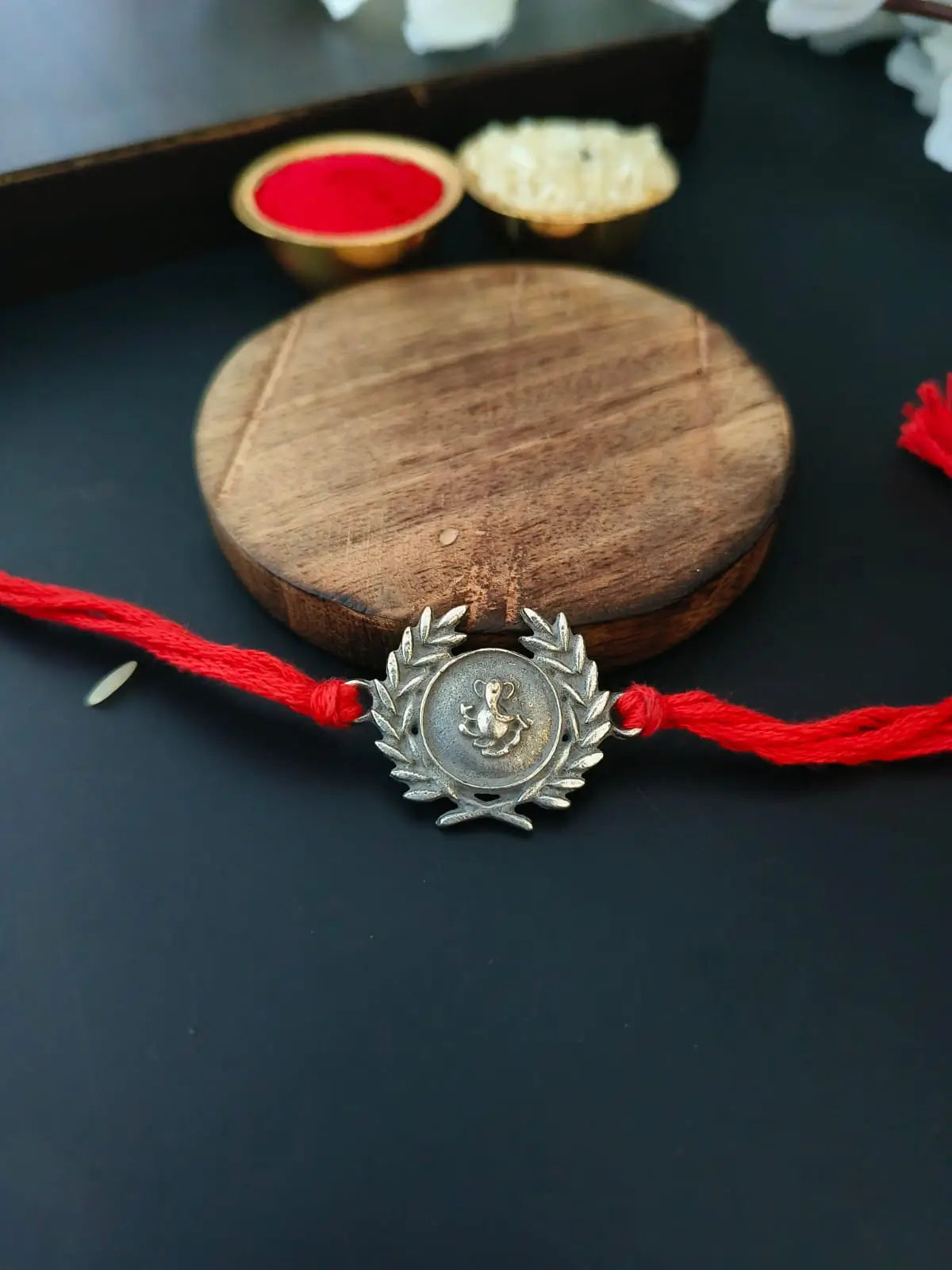 Ganesha Leaf Rakhi in Silver Shine | Dynamic Jewelove