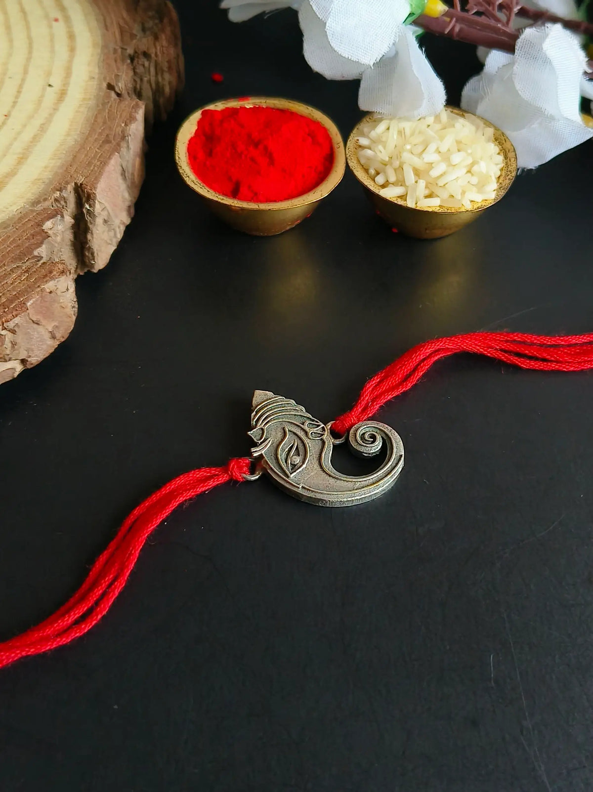 Antique Ganesha Face Rakhi with Red Thread | Dynamic Jewelove