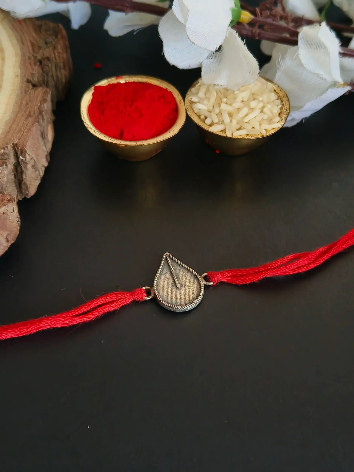 Textured Silver Teardrop Rakhi Thread | Dynamic Jewelove