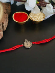 Textured Silver Teardrop Rakhi Thread | Dynamic Jewelove